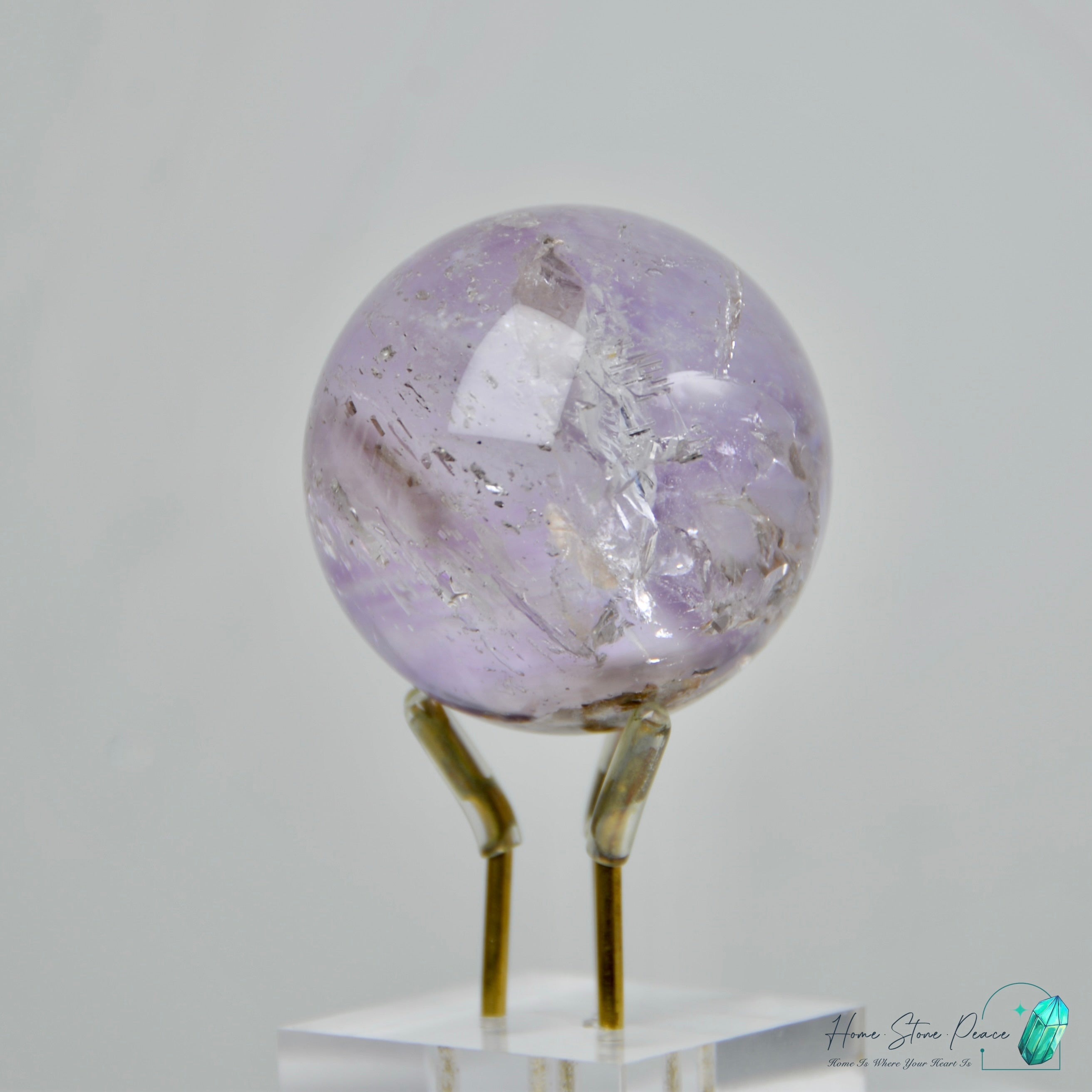 紫骸骨黃泥水晶球 Skeletal Amethyst Sphere with Yellow Mud Inclusion
